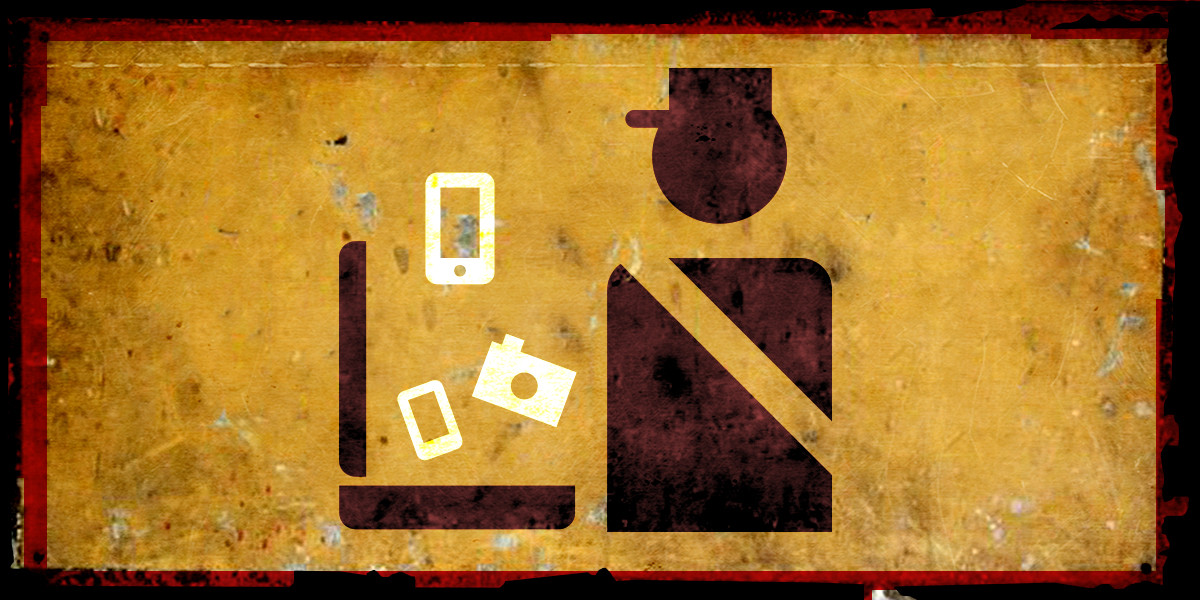 Border Searches icon of a border agent examining digital devices